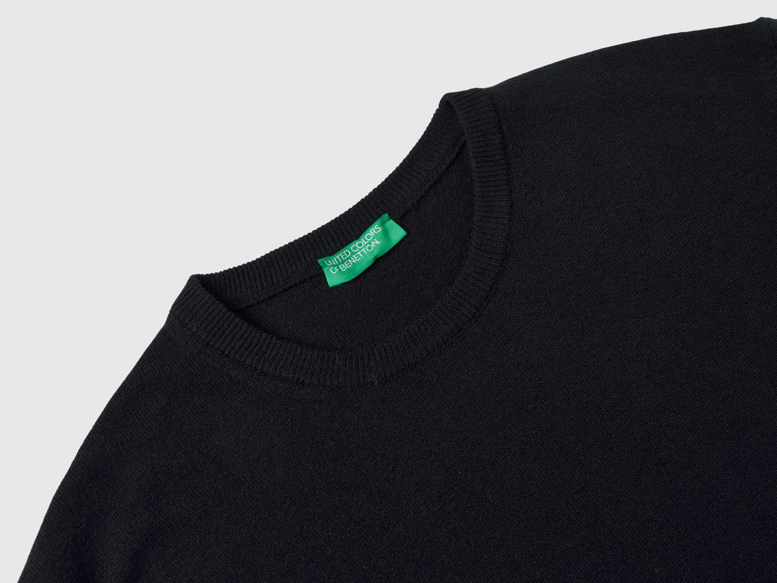 Black sweater in pure Merino wool - Black | Benetton