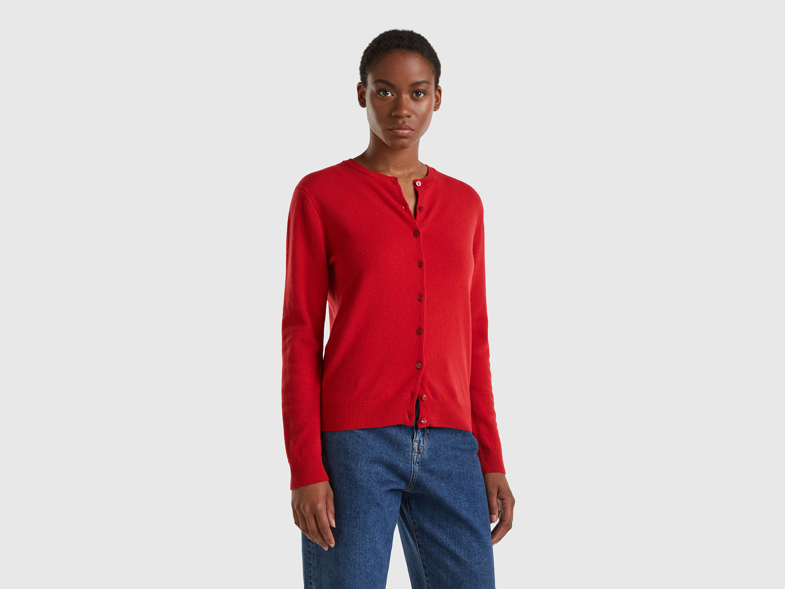 Red crew neck cardigan in pure Merino wool Red Benetton