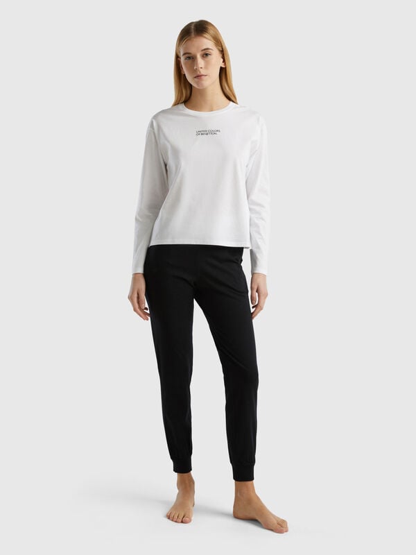 Trousers with elastic logo Women