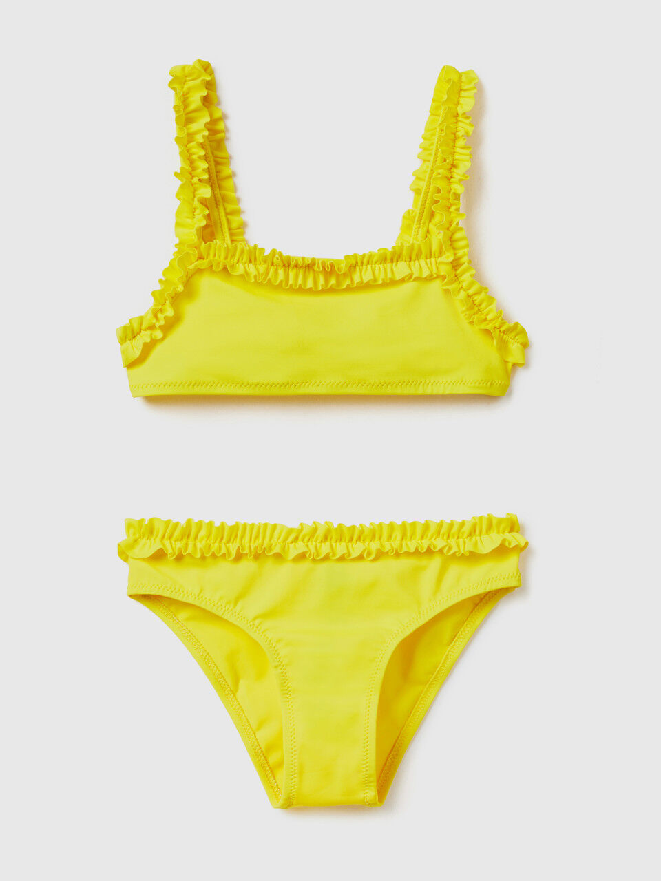 One-piece swimsuit in ECONYL® with flounces