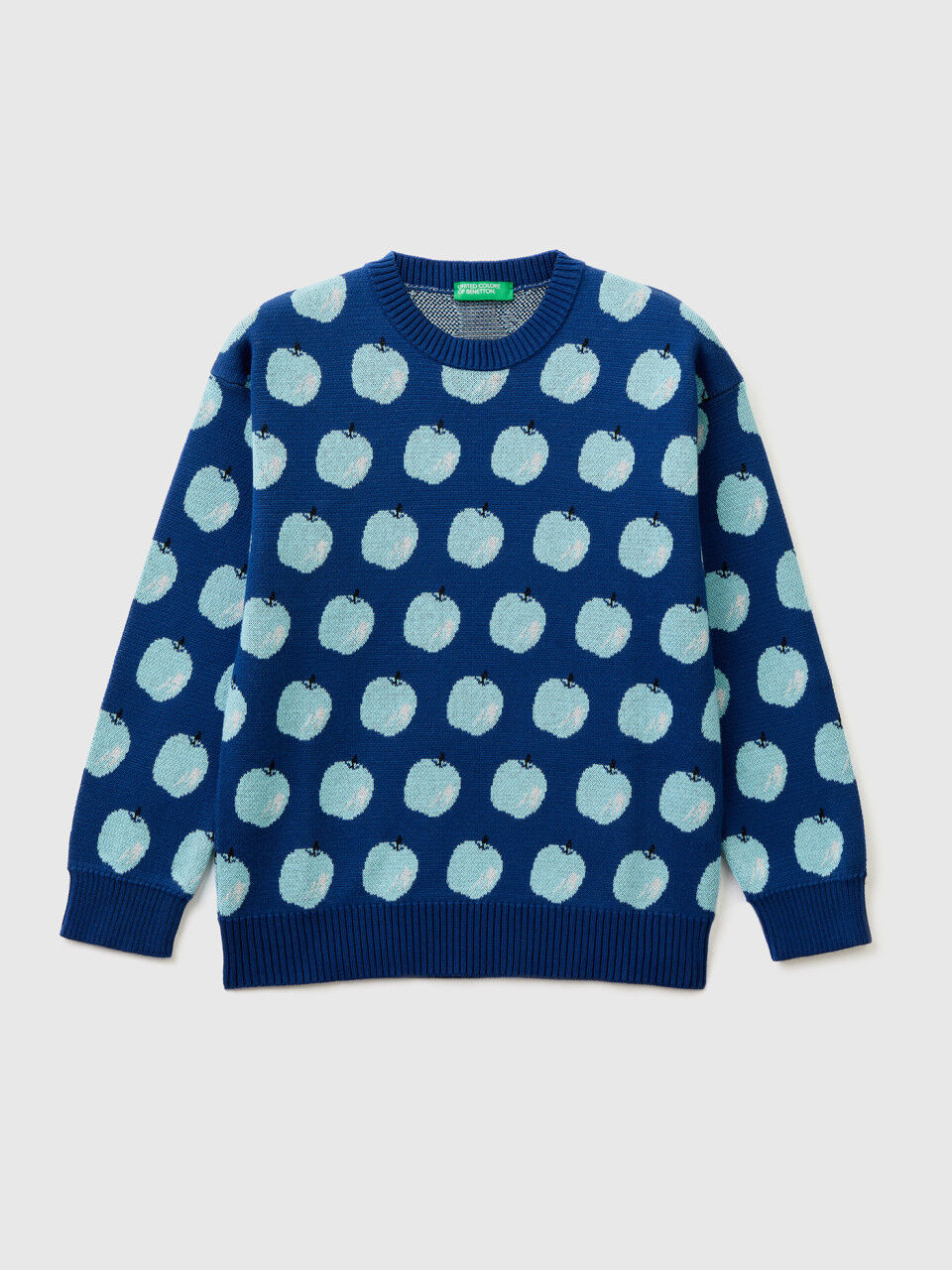 Blue sweater with apple pattern