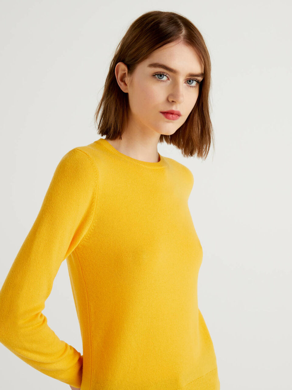 Yellow crew neck sweater in pure virgin wool - Yellow | Benetton