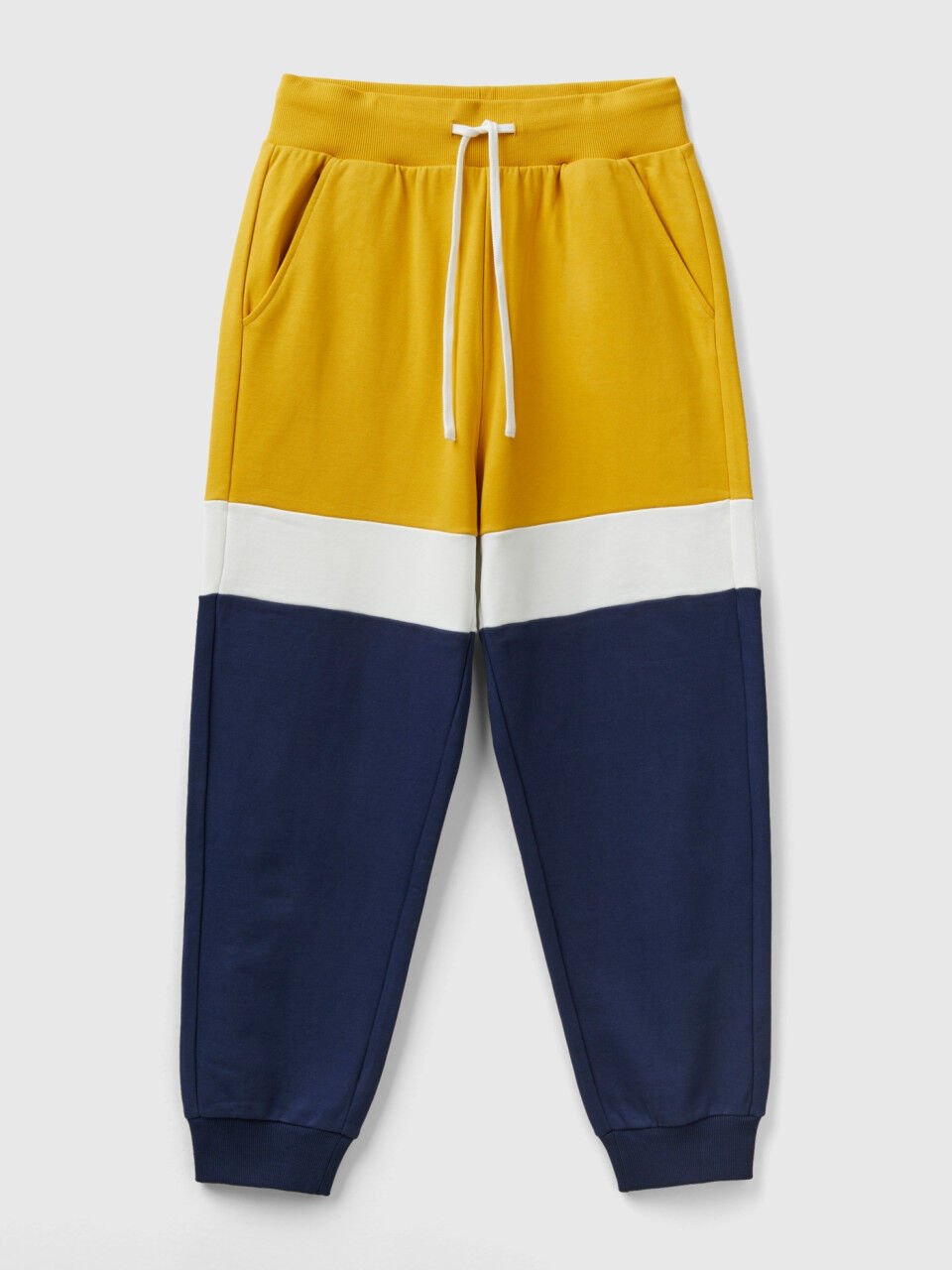 Yellow and blue track pants top