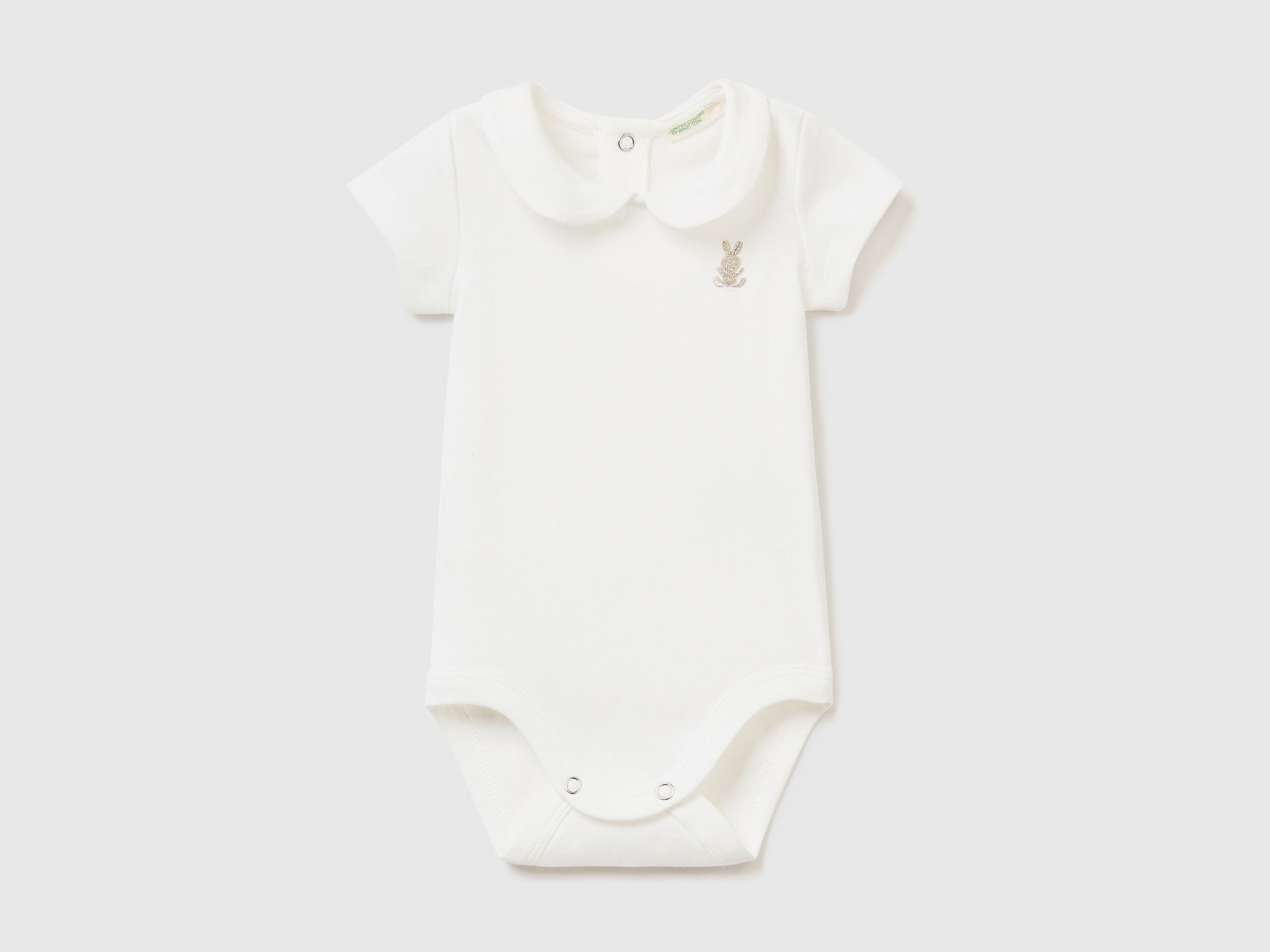 Onesie with collar in organic cotton Creamy White Benetton