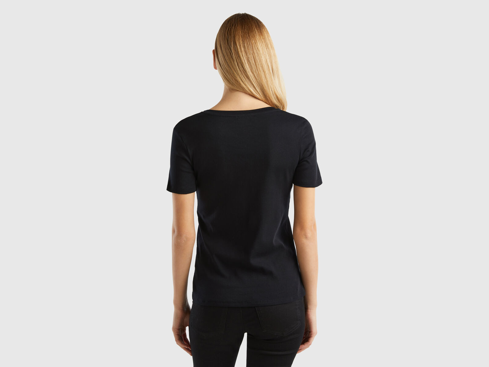 Pure cotton t-shirt with V-neck - Black | Benetton