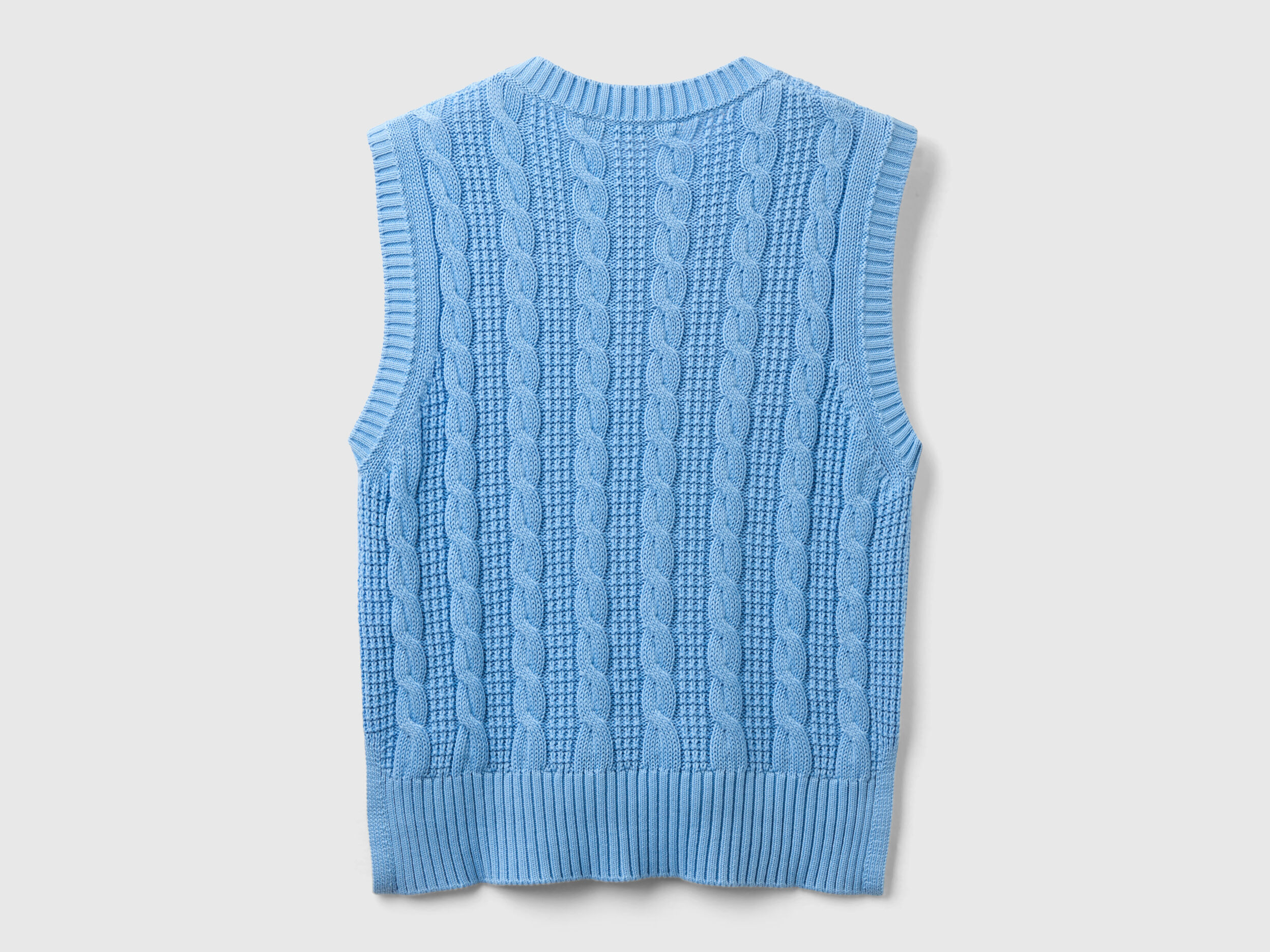 Cropped cable knit vest