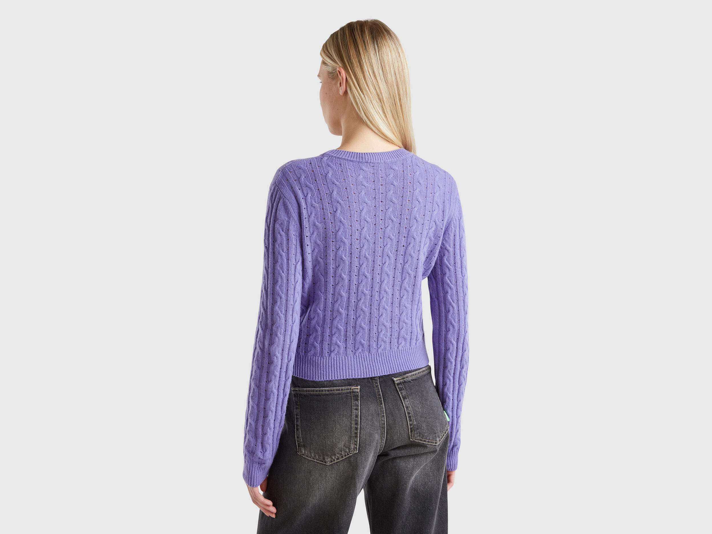 Cropped sweater with cable knit and perforations - Purple | Benetton