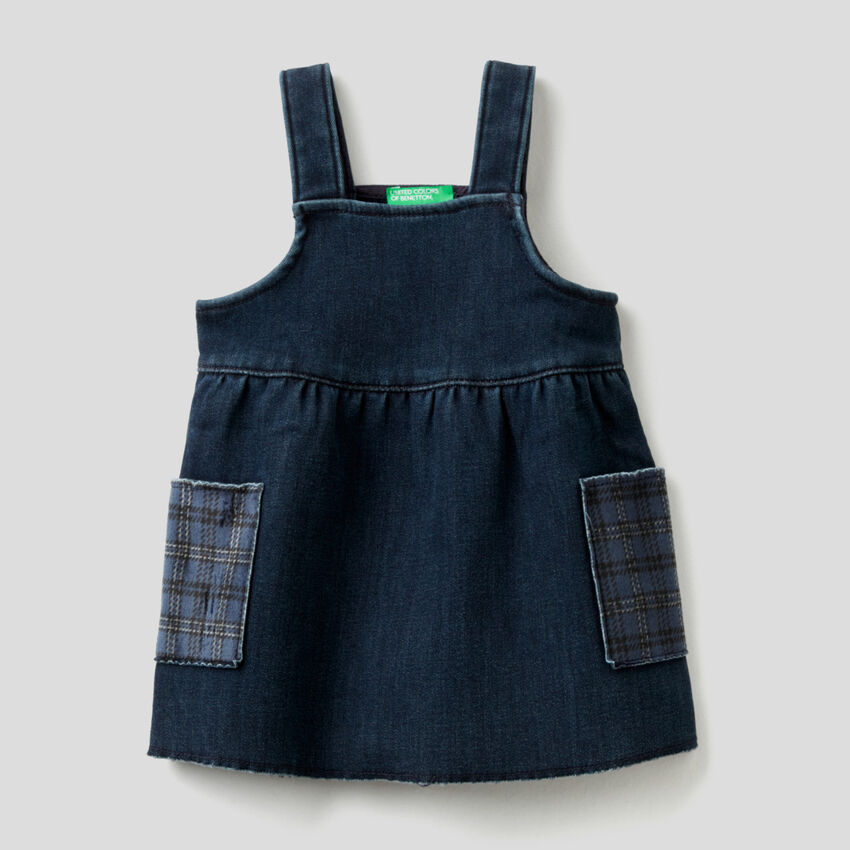 Denim dungaree skirt with patterned pockets