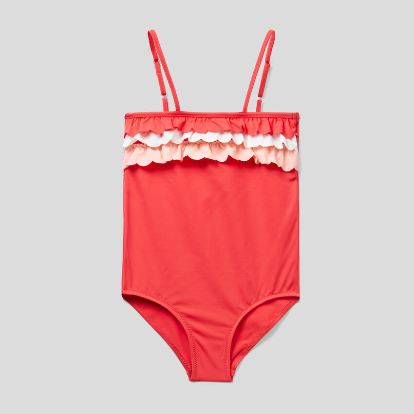One-piece swimsuit in ECONYL® with frills
