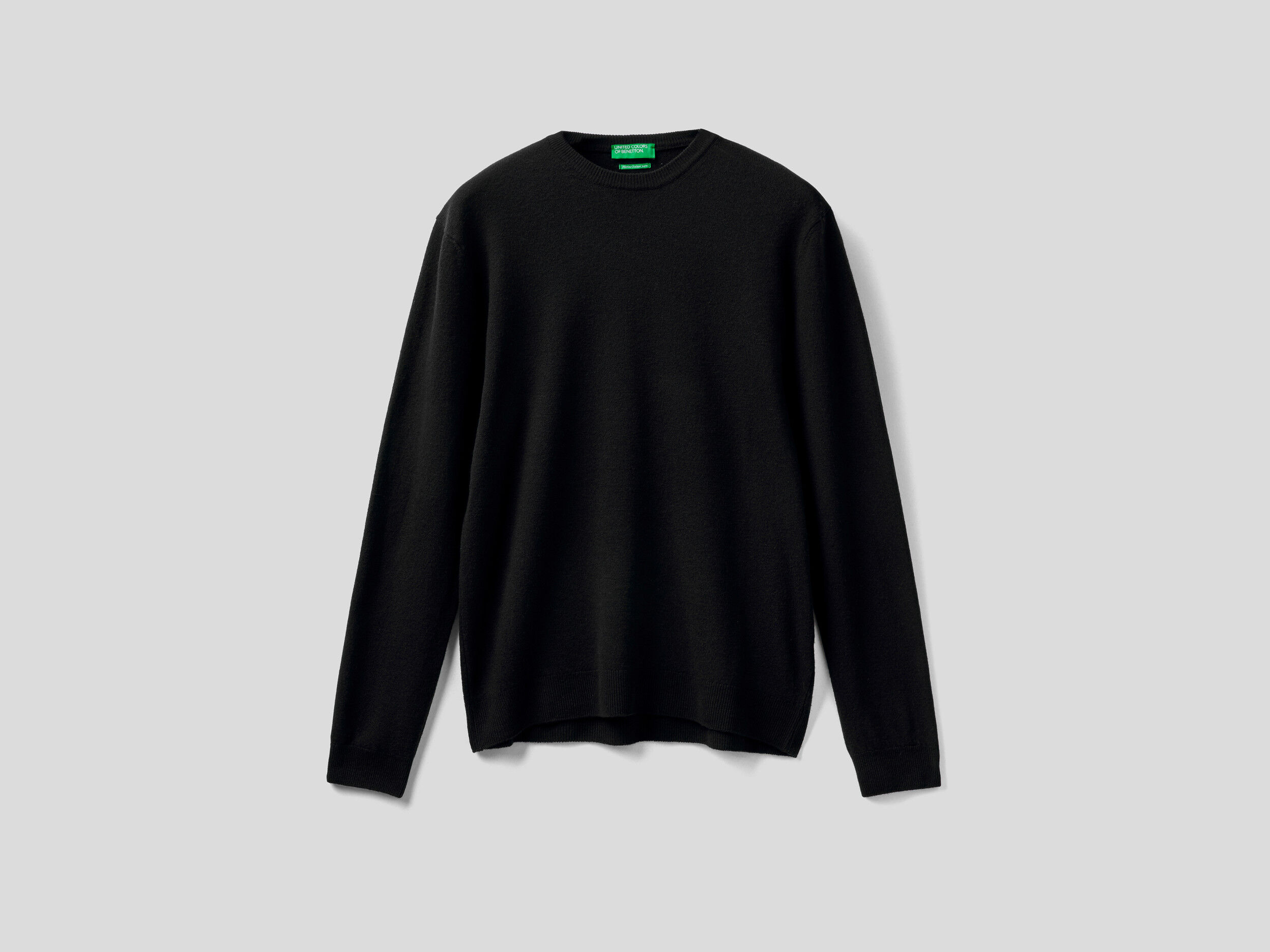 Black crew neck sweater in pure Merino wool - Black | Benetton