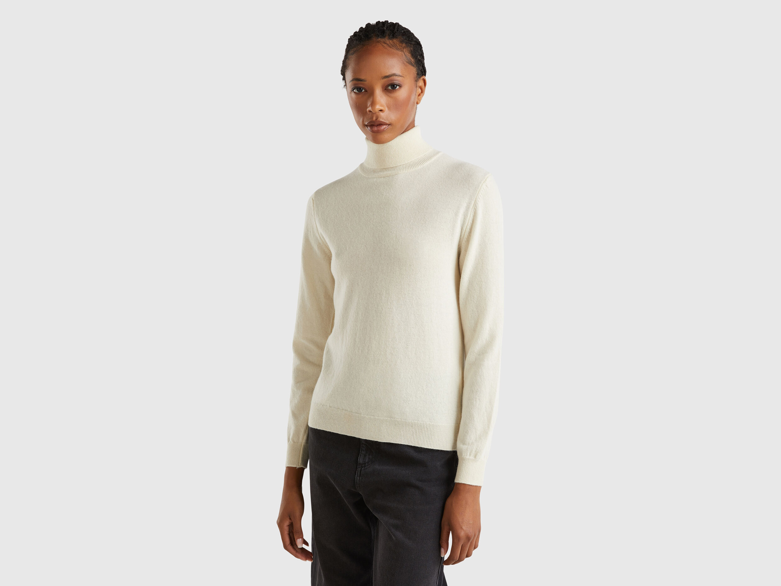 Sweatshirt over turtleneck top