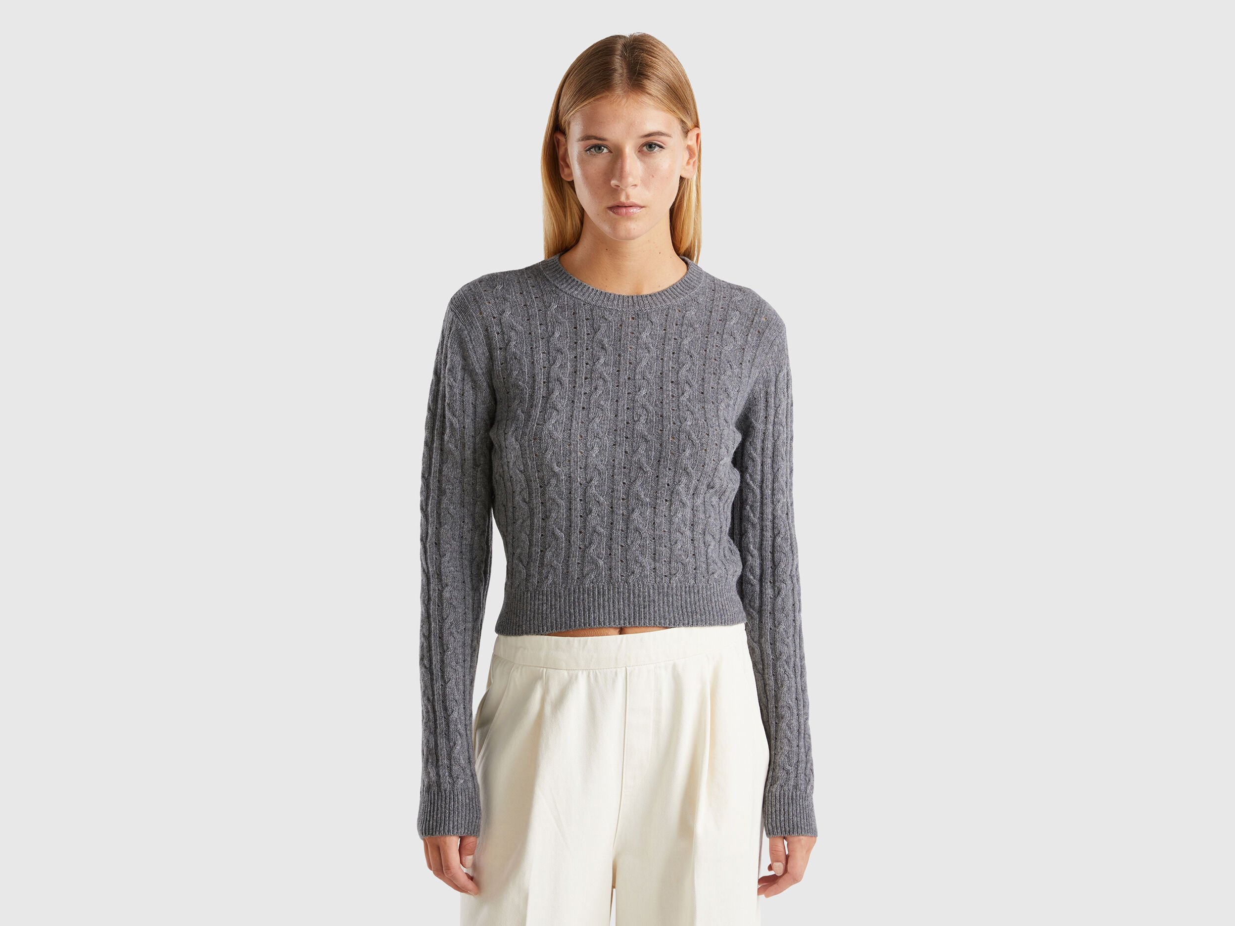 Cropped sweater with cable knit and perforations - Dark Gray | Benetton Cropped sweater with cable knit and perforations - Dark Gray | Benetton