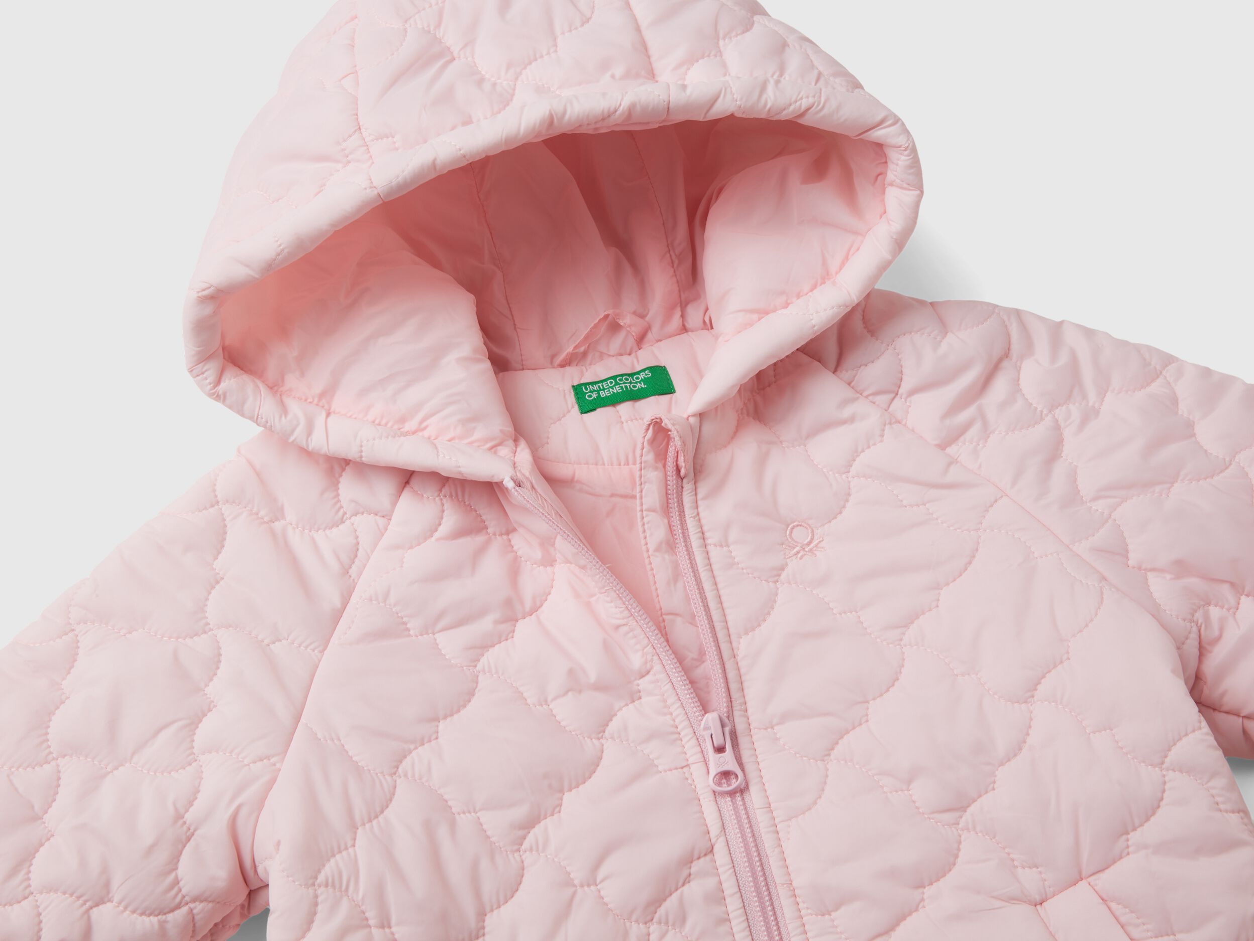 Pale pink quilted jacket on sale
