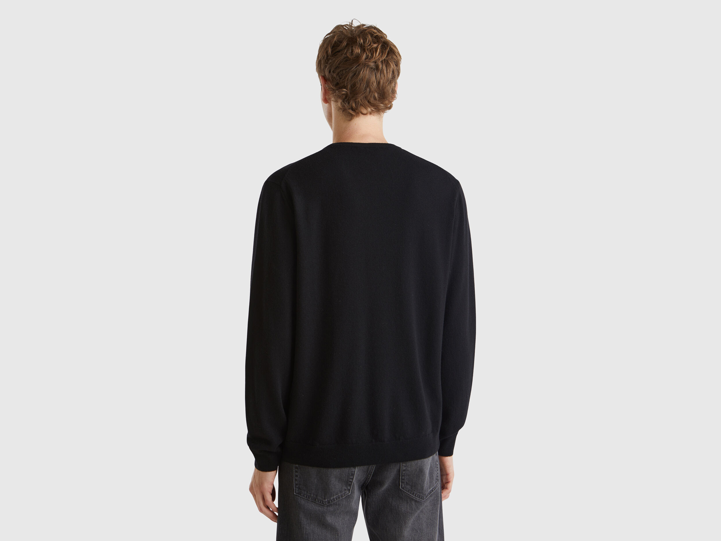 Black crew neck sweater in pure Merino wool