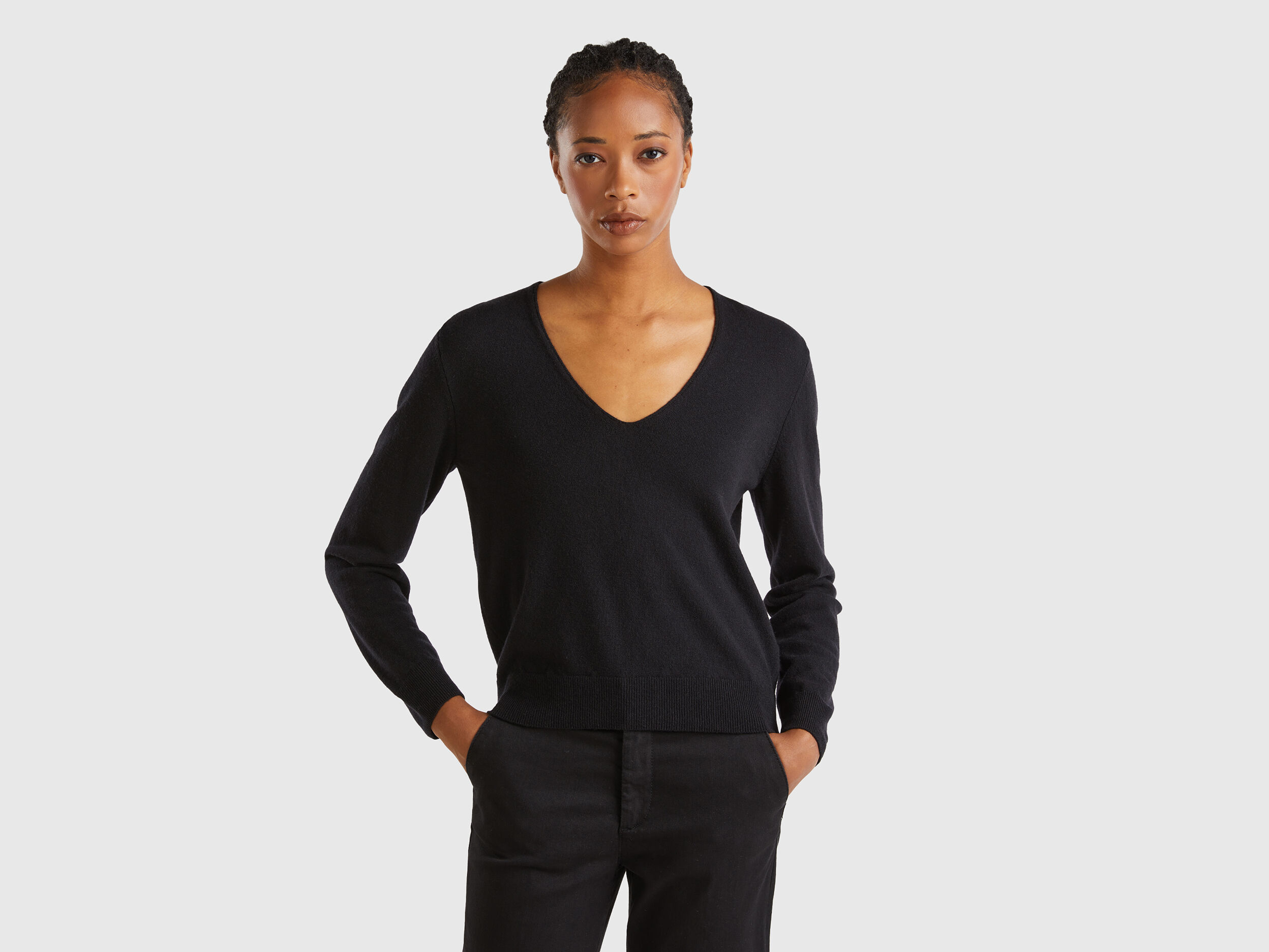 Black V neck sweater in pure Merino wool Black Benetton