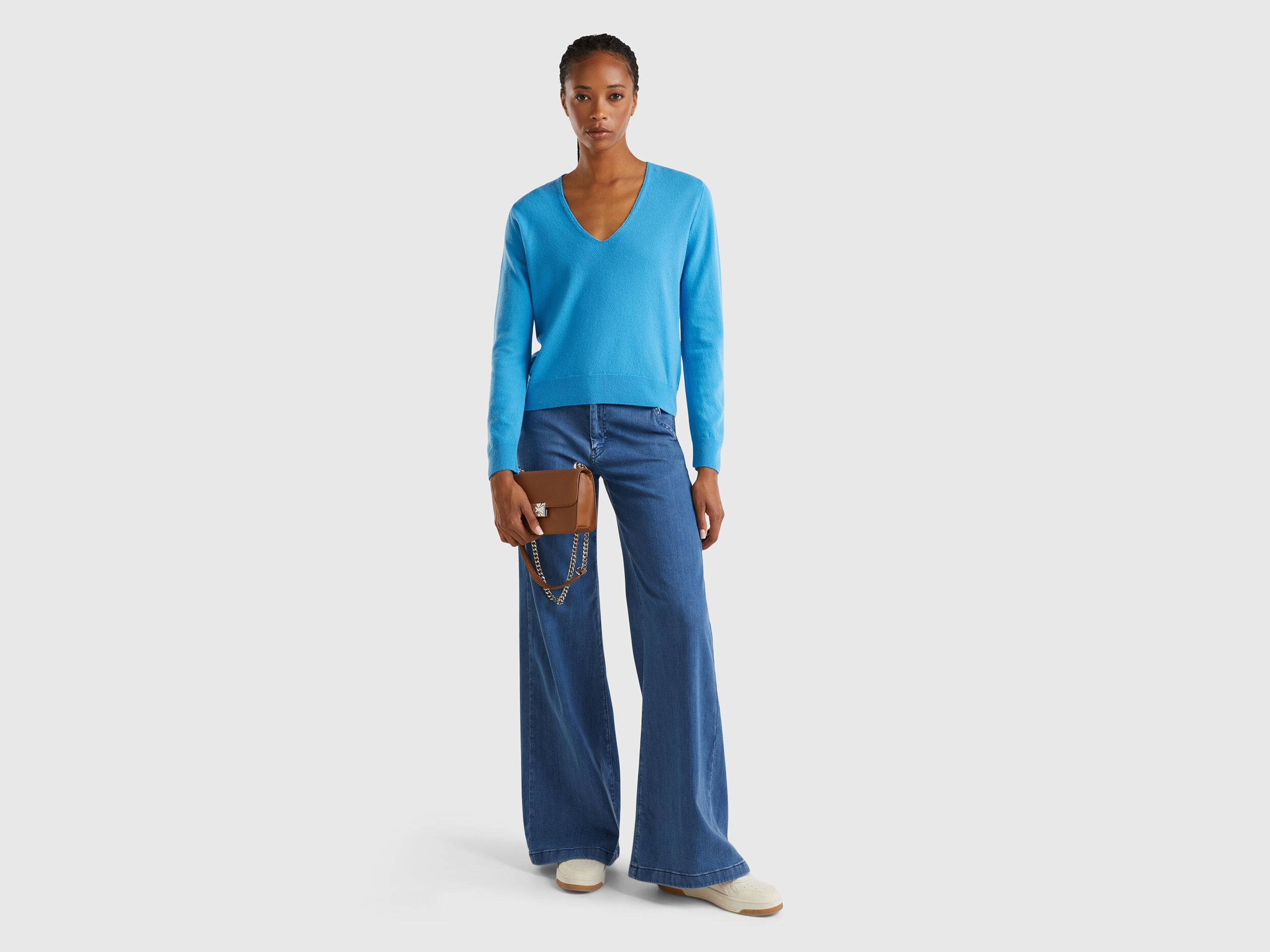 Sky blue V neck sweater in pure Merino wool Light Blue Benetton