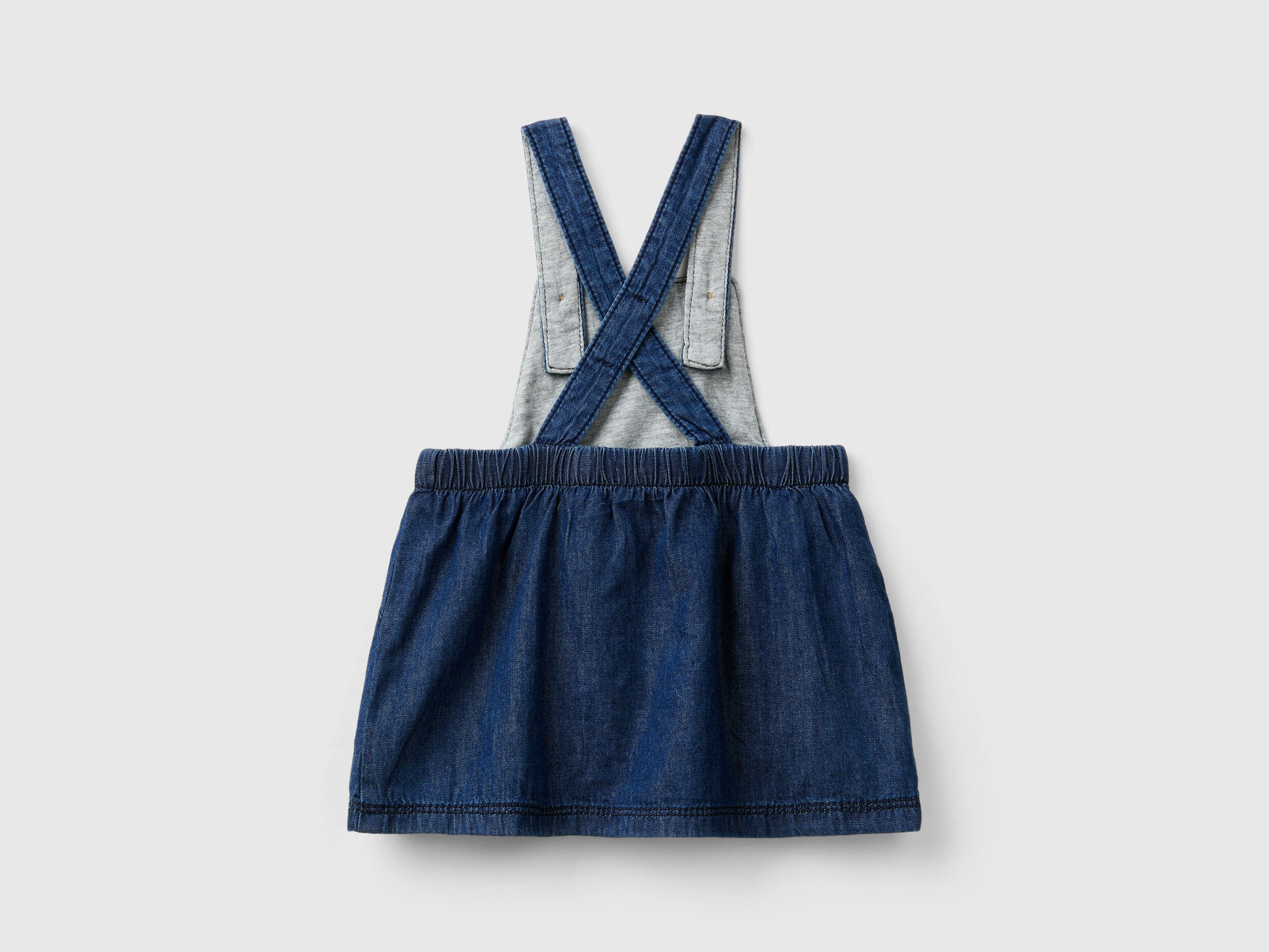 Skirt overalls in chambray Blue Benetton