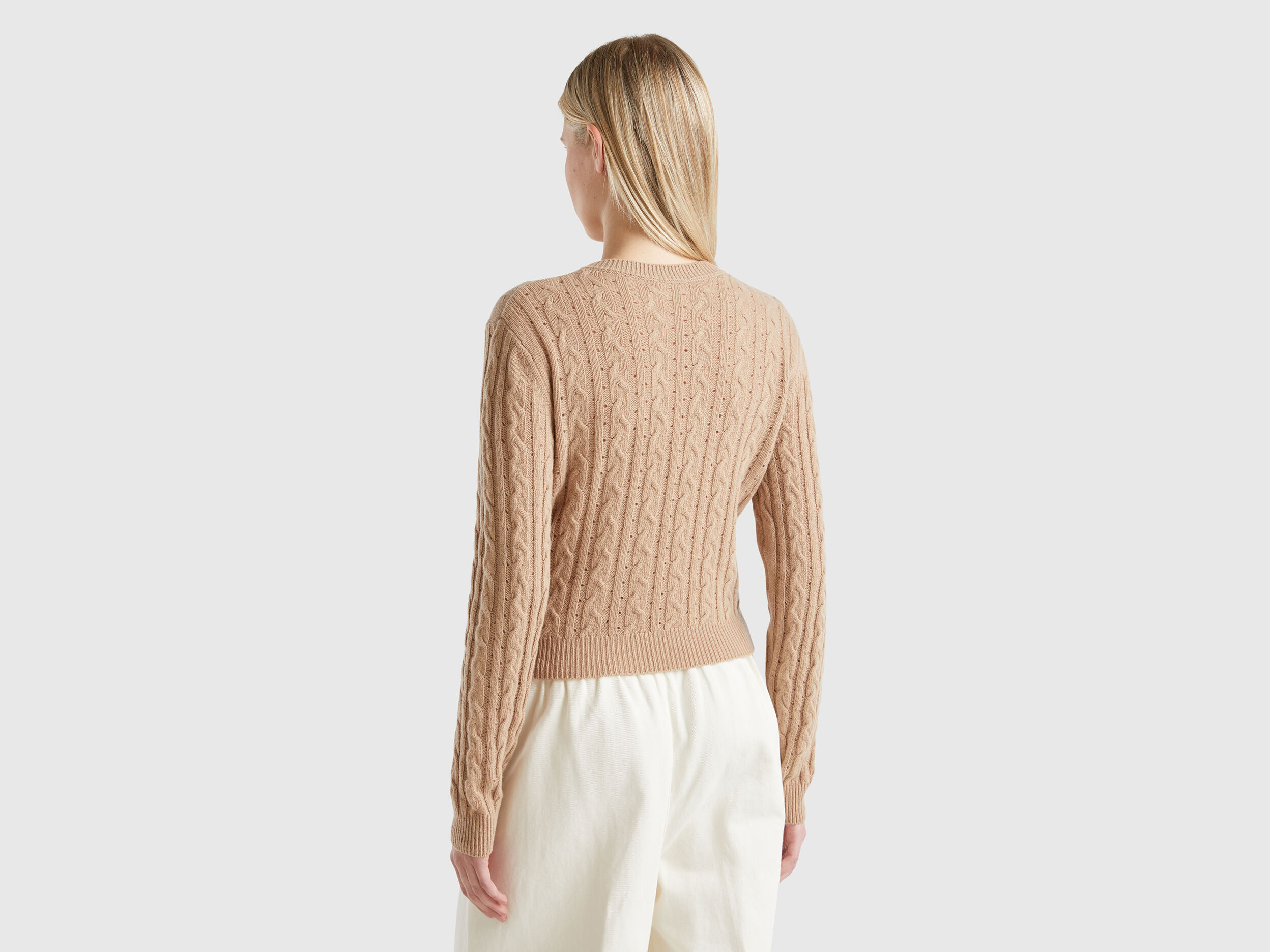 Cropped sweater with cable knit and perforations - Purple | Benetton