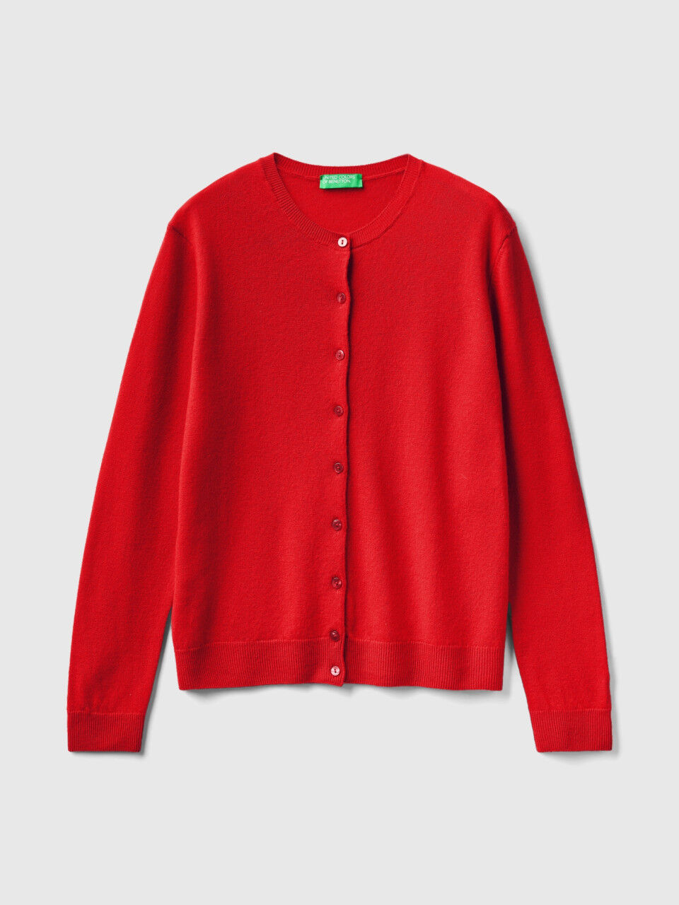 Red crew neck cardigan in pure Merino wool Red Benetton