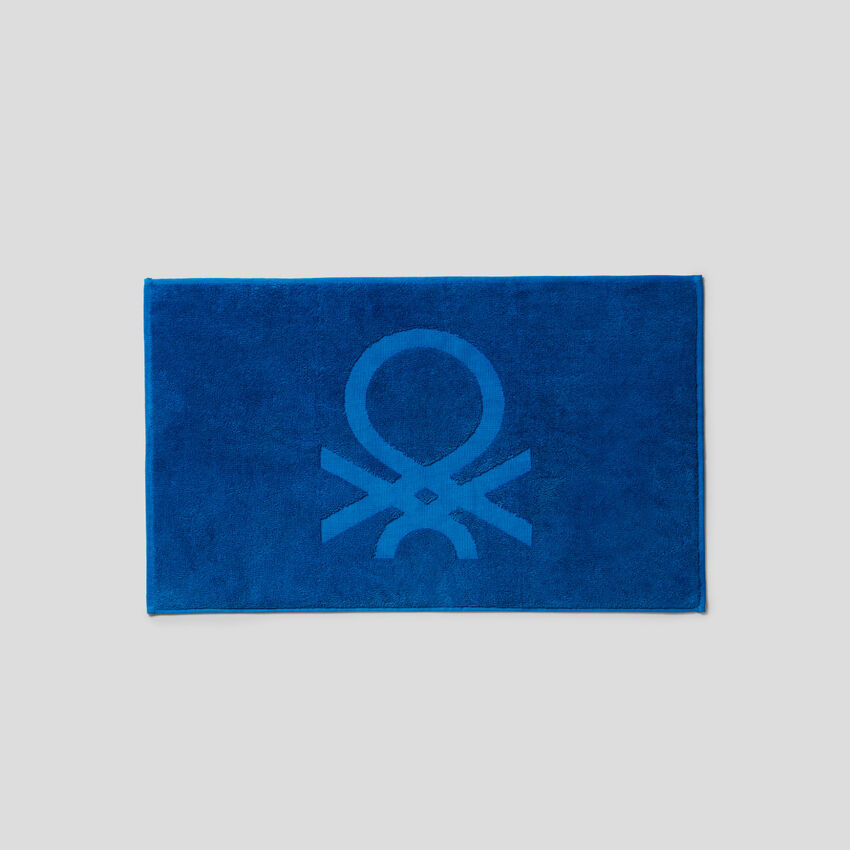 Bath mat with Benetton logo