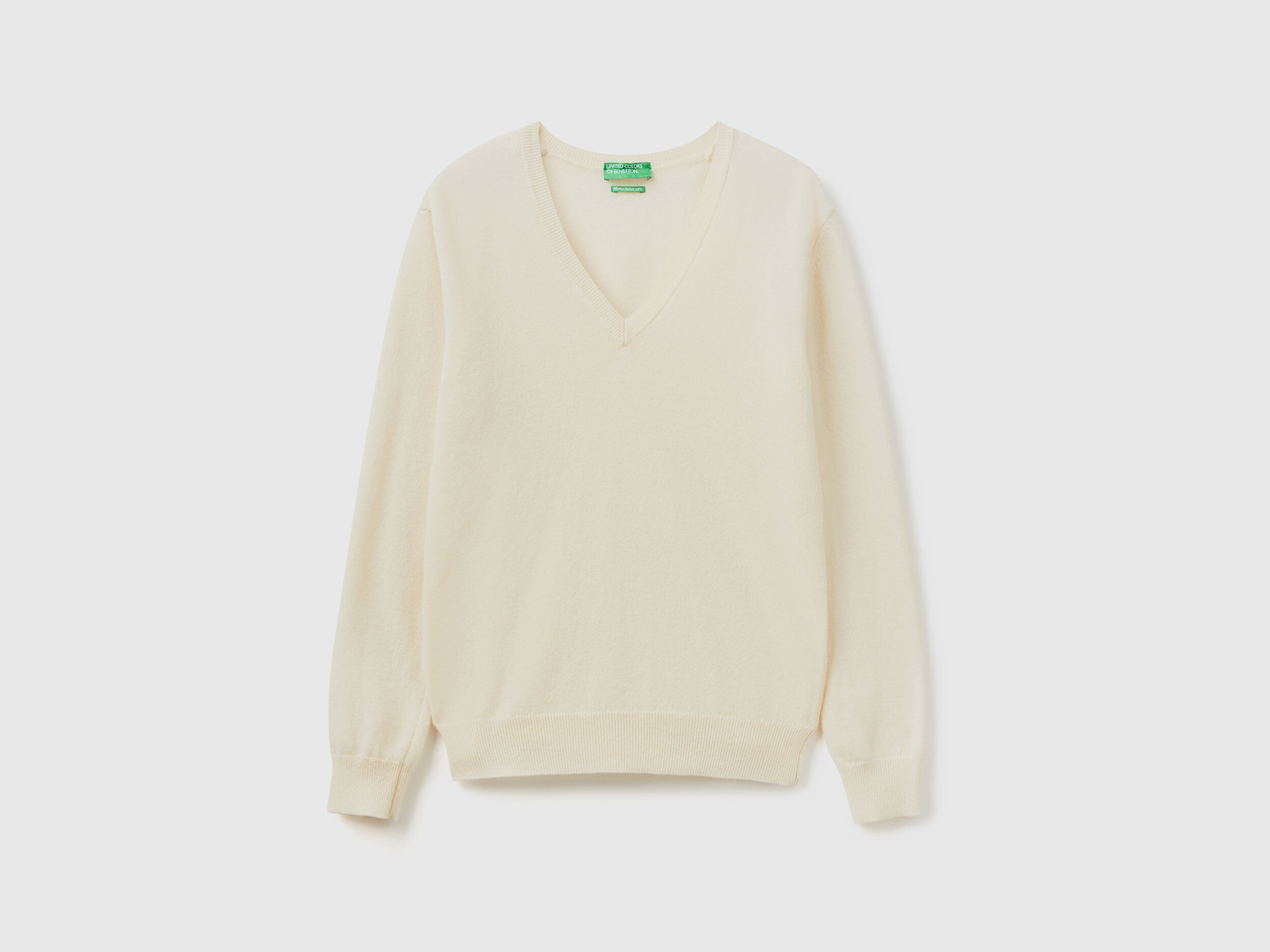 Cream colored outlet v neck sweater