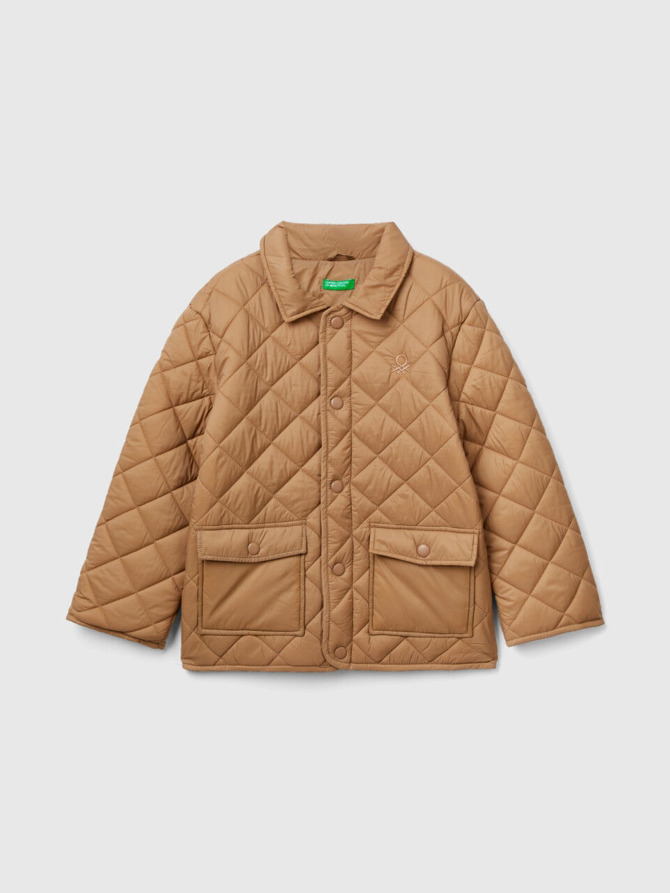 Benetton 2025 plumifero niño