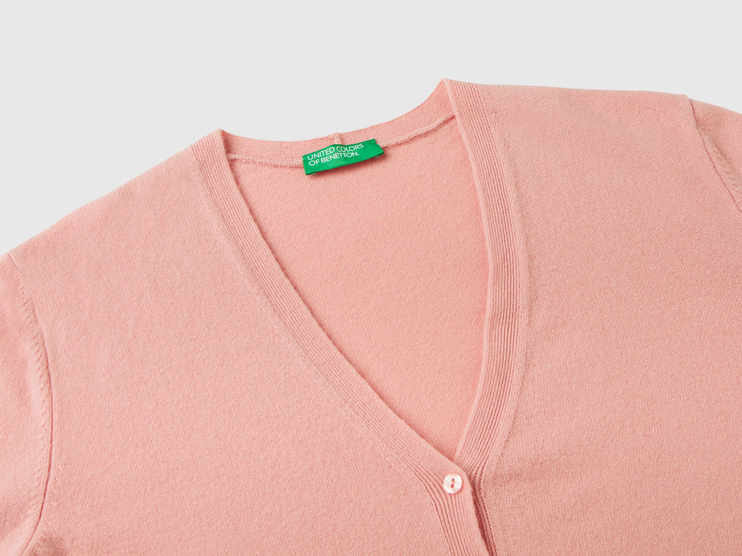 Pink V-neck cardigan in pure Merino wool