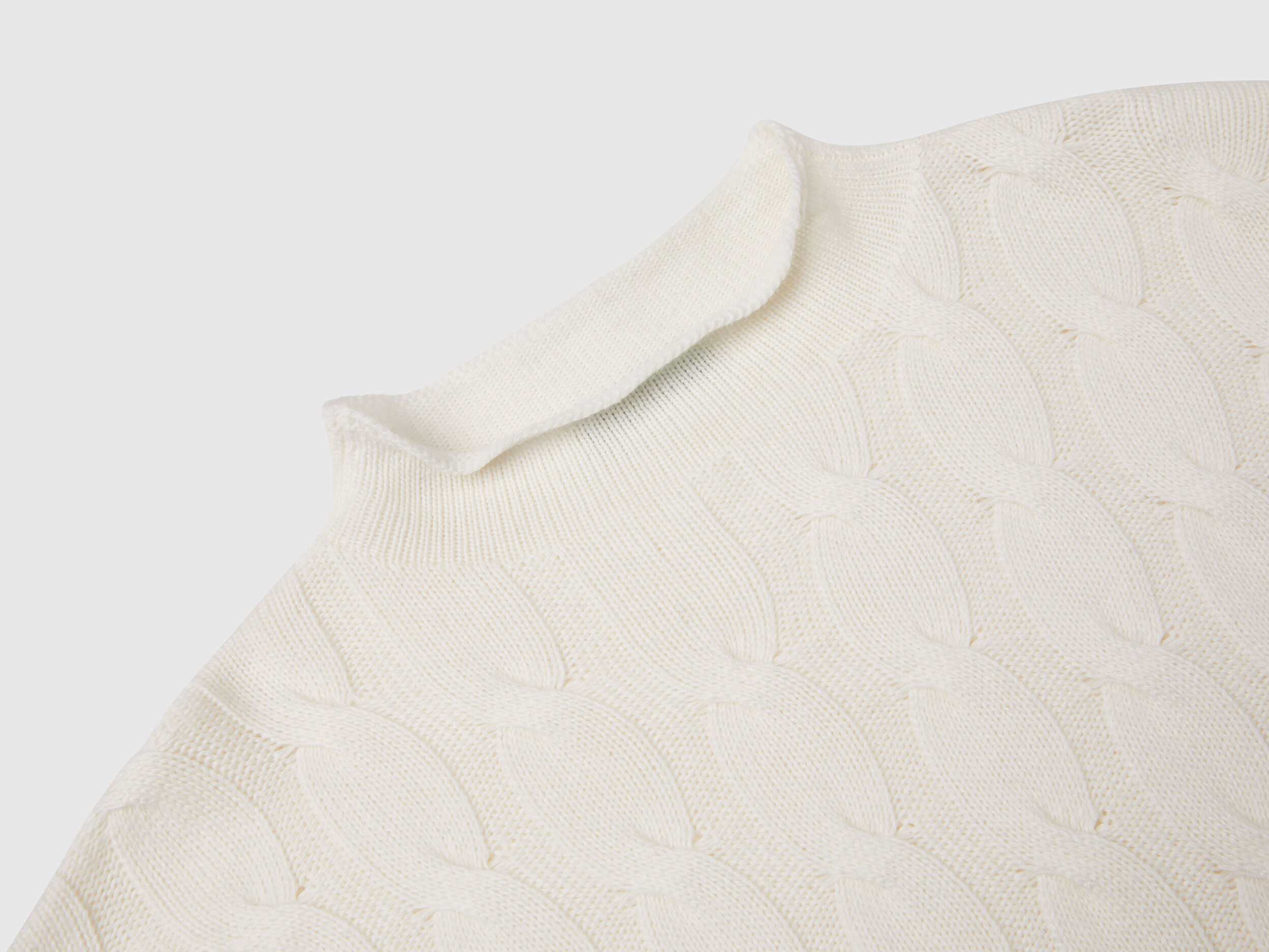 Cropped sweater with cable knit and perforations - Creamy