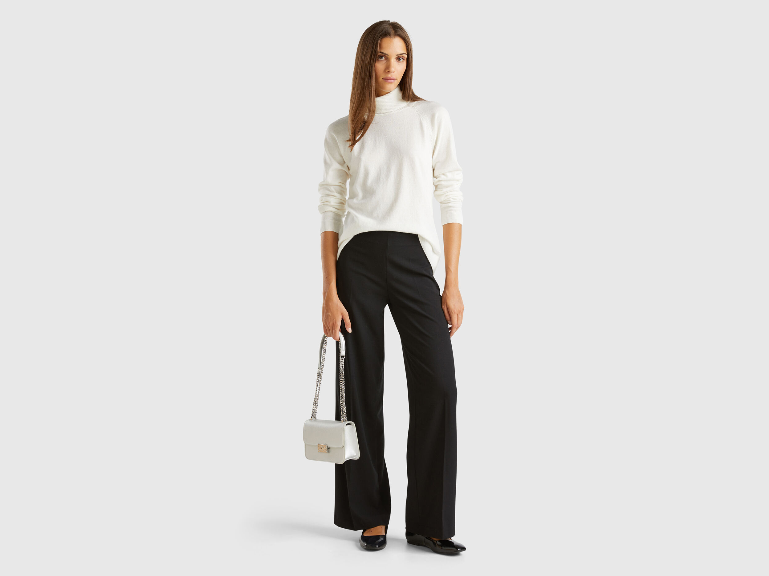 Flowy high-waisted trousers - Black | Benetton
