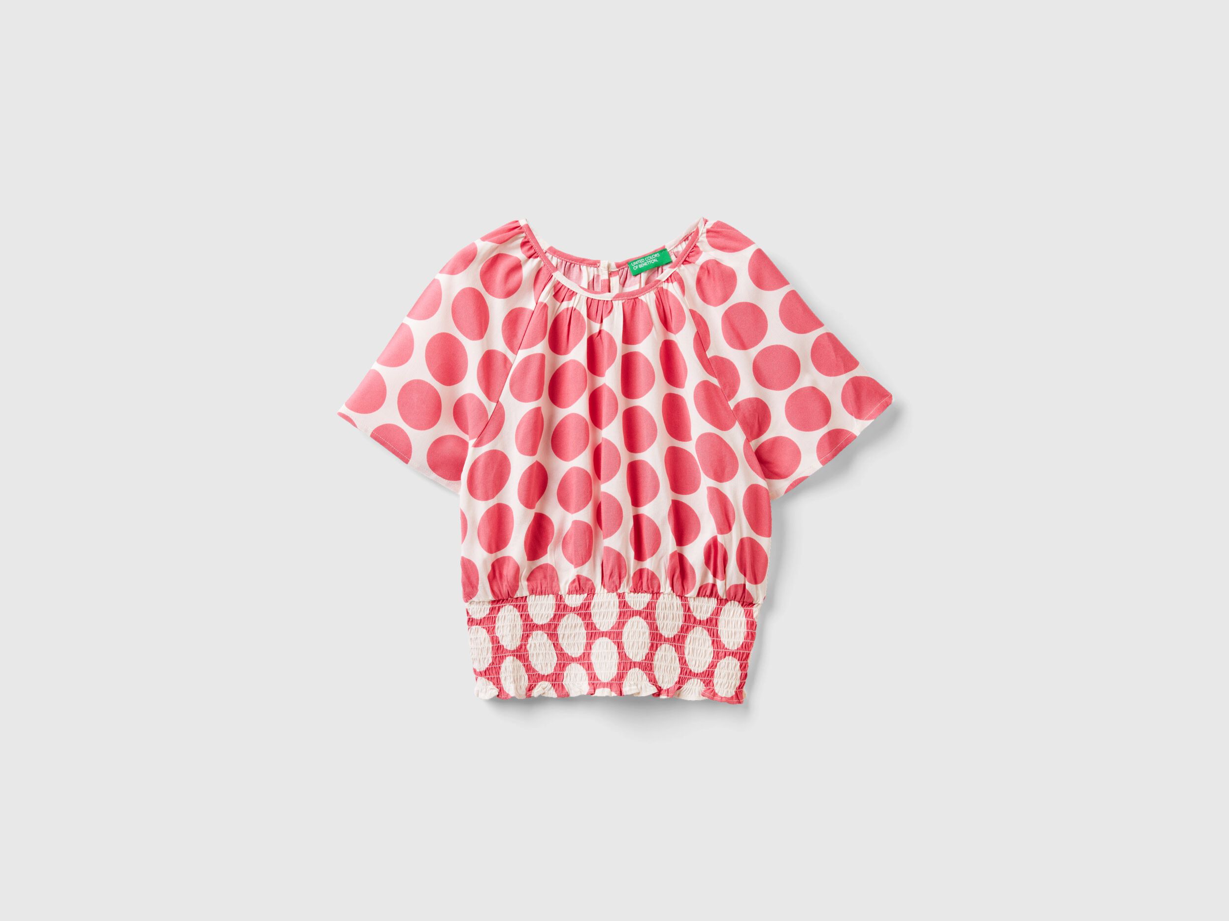 Multi colored polka dot blouse store