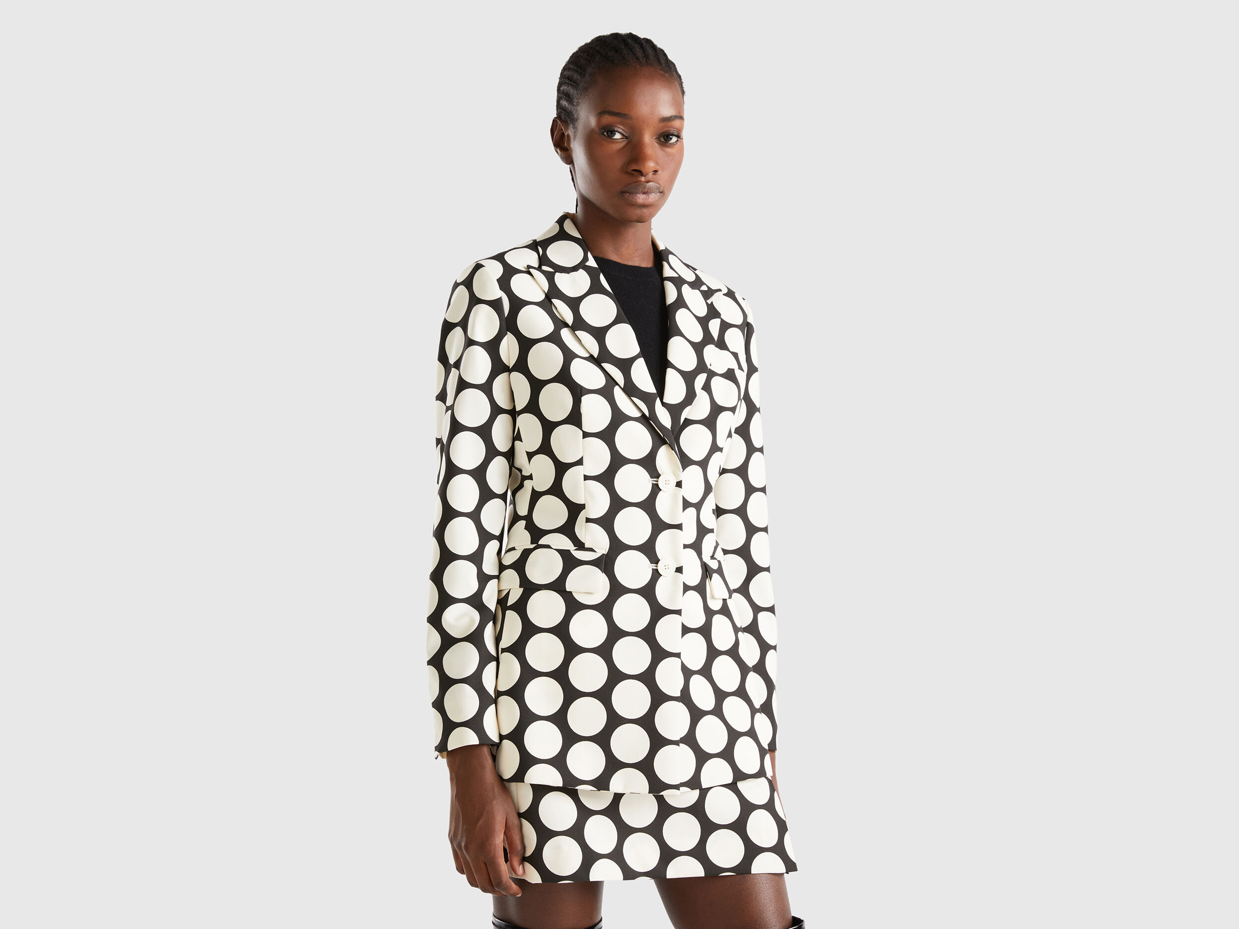 White blazer with top black polka dots