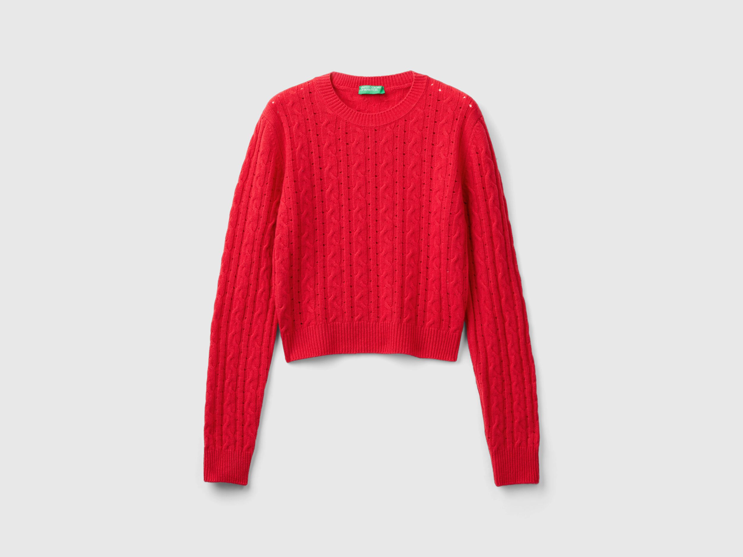 Cropped sweater with cable knit and perforations - Red | Benetton