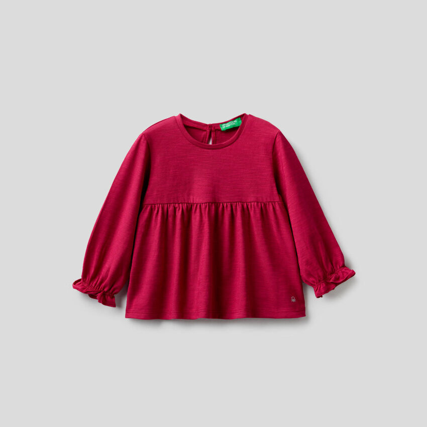 Blouse in 100% organic cotton with frill