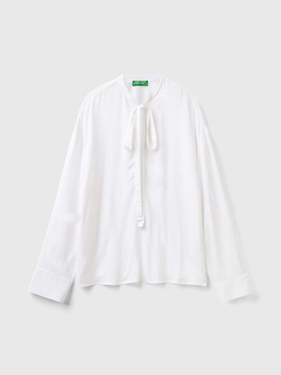 Flowy white blouse deals