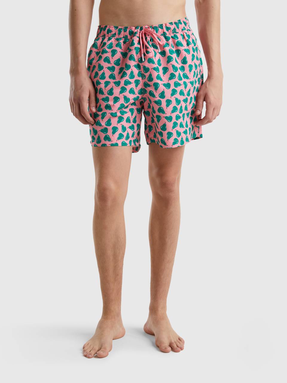 Benetton pink swim trunks with pear pattern. 1