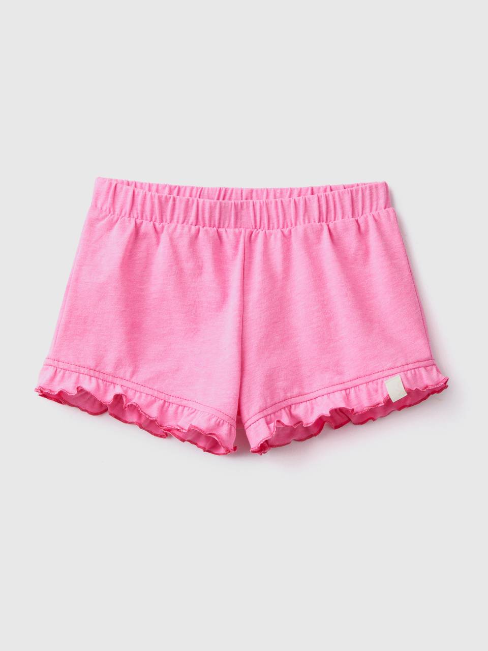 Benetton shorts in recycled fabric with ruffles. 1