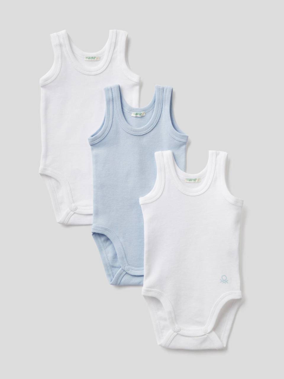 Benetton Three solid color tank top bodysuits. 1