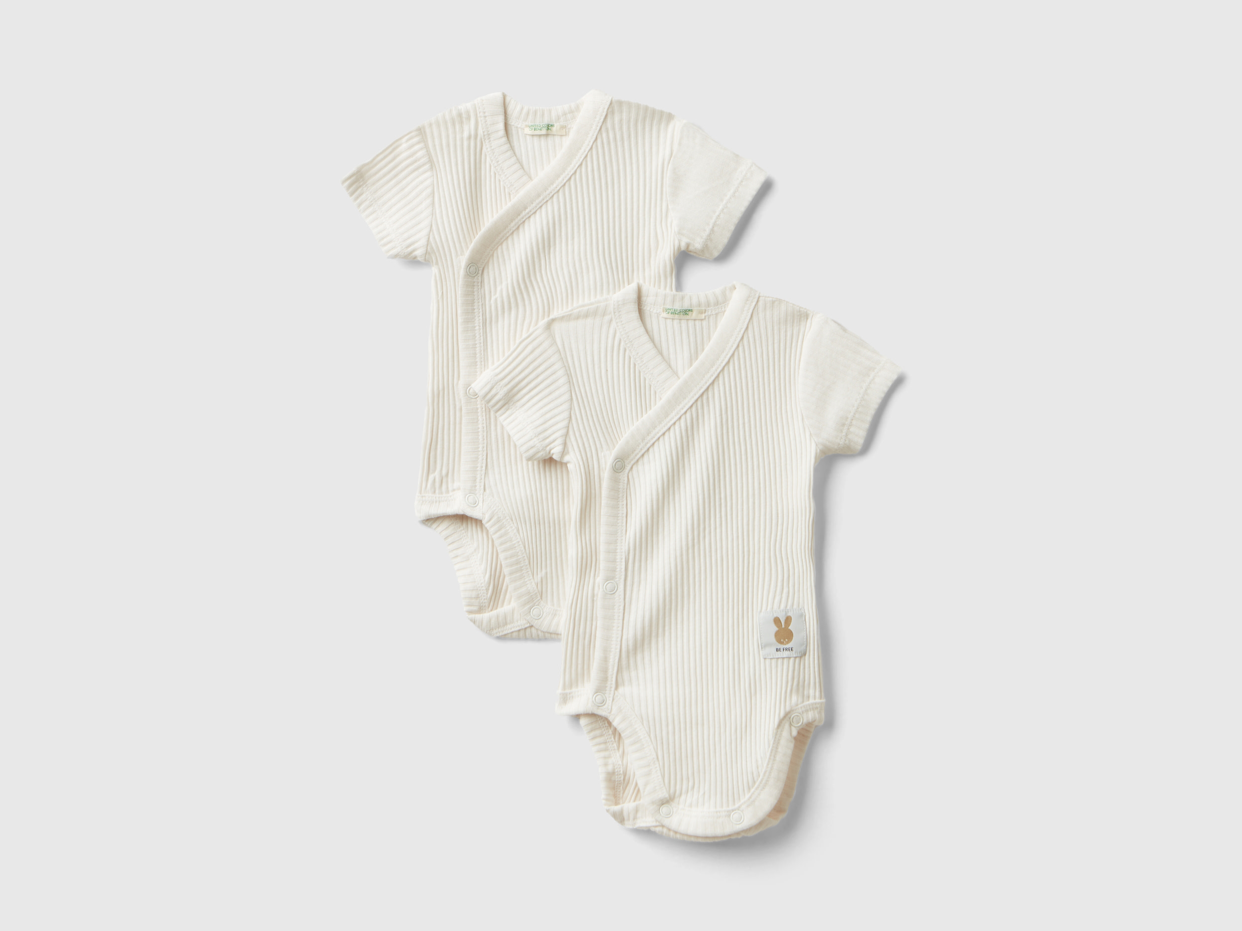 Image of Benetton, Two Short Sleeve Ribbed Knit Bodysuits, size 50, Creamy White, Kids