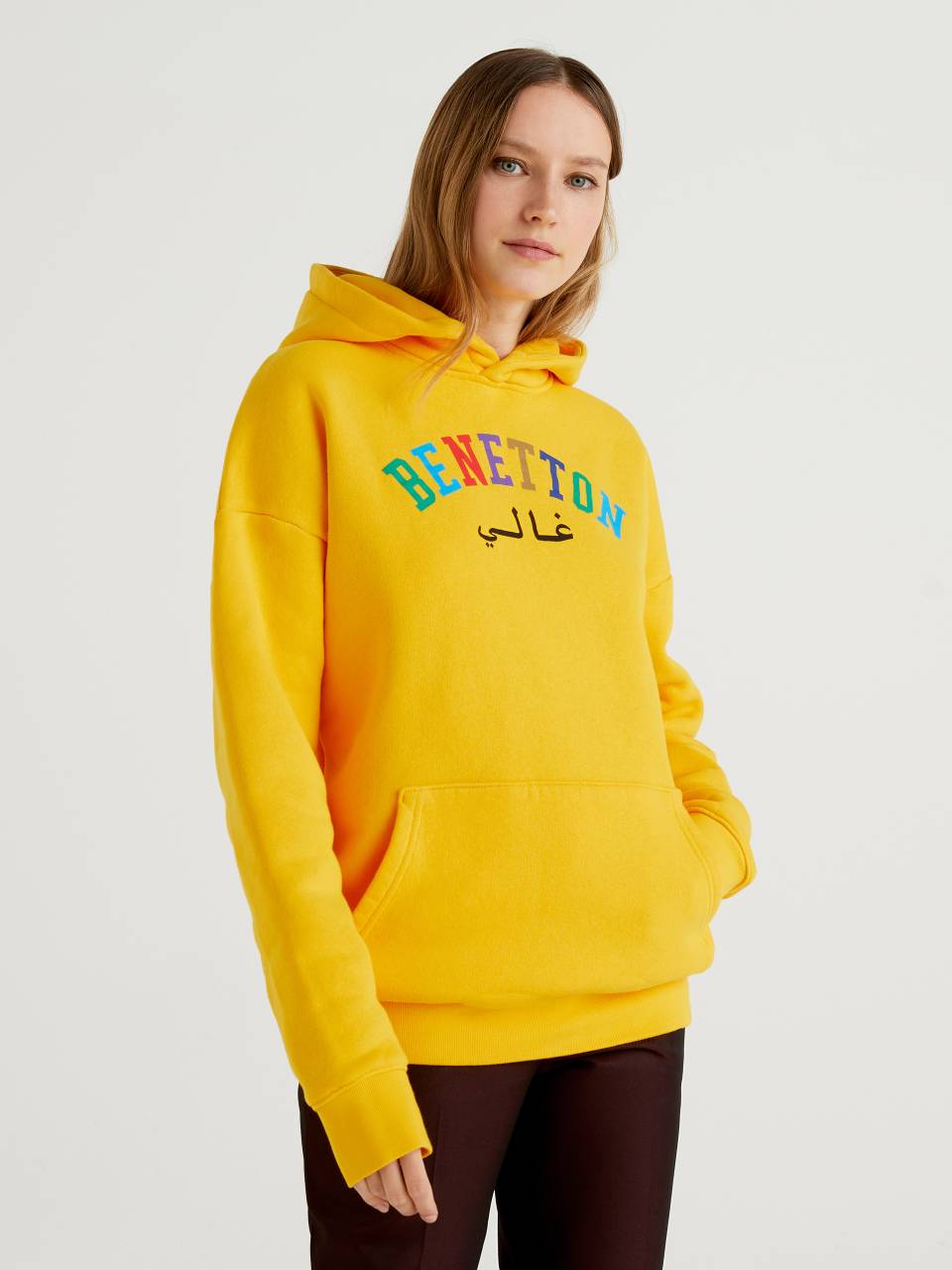 Benetton Yellow sweatshirt with hood and print by Ghali. 1