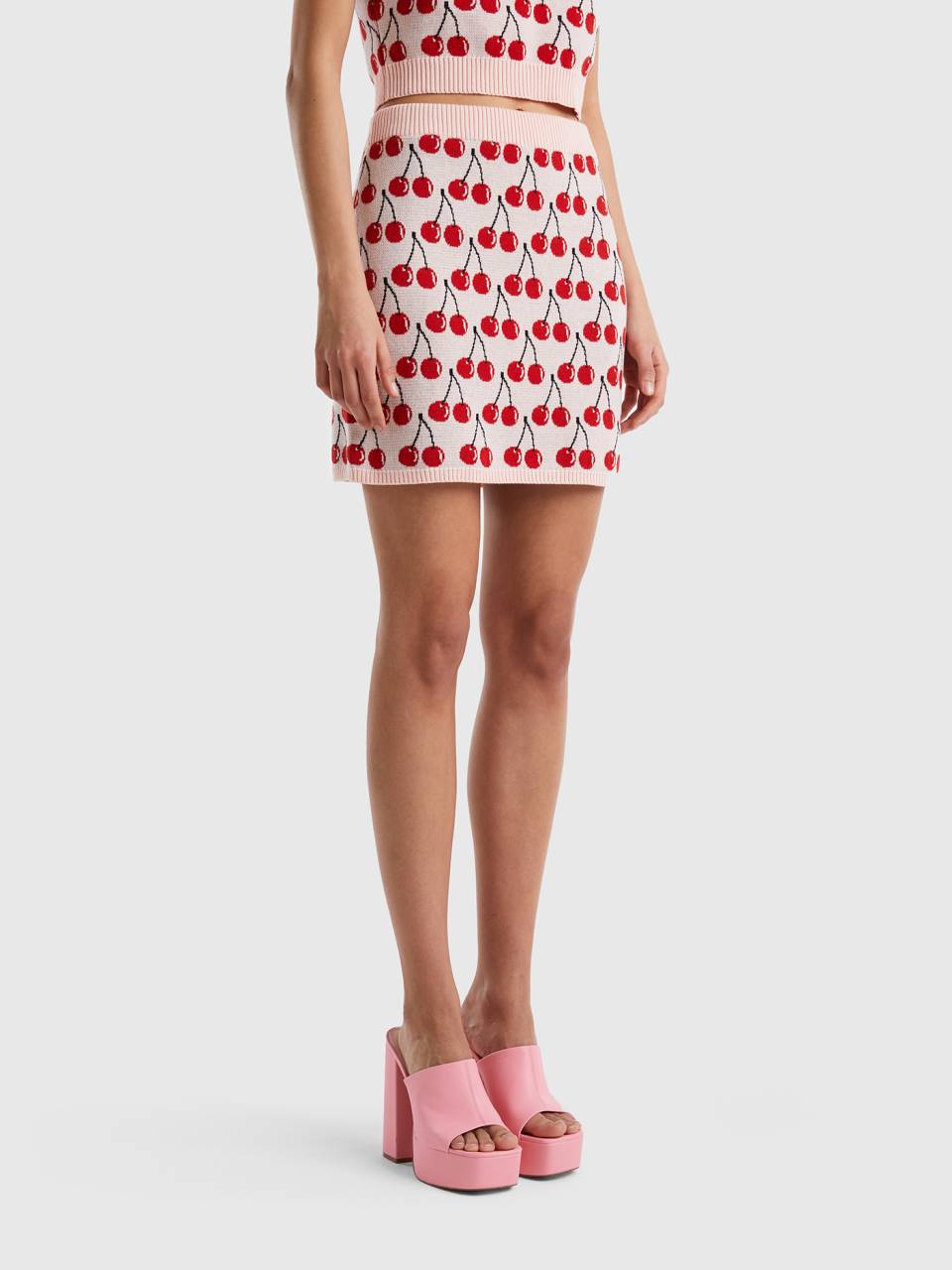 Benetton pink mini skirt with cherry pattern. 1